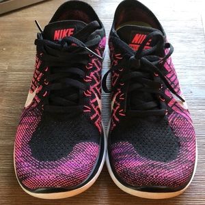 Pink and black nike frees